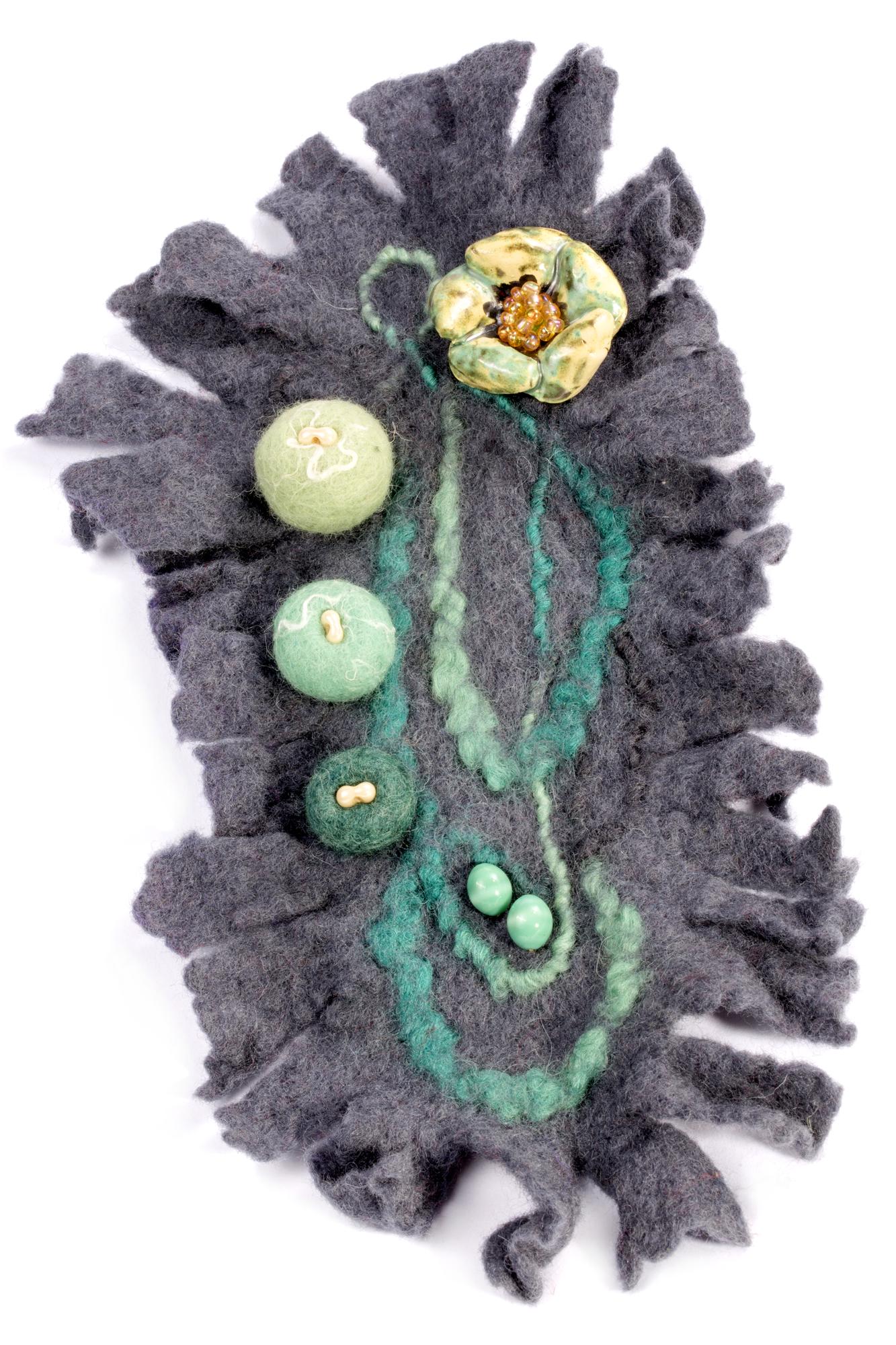 series of embroidered patches arranged asymmetrically